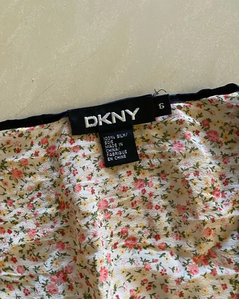 DKNY بلوزات