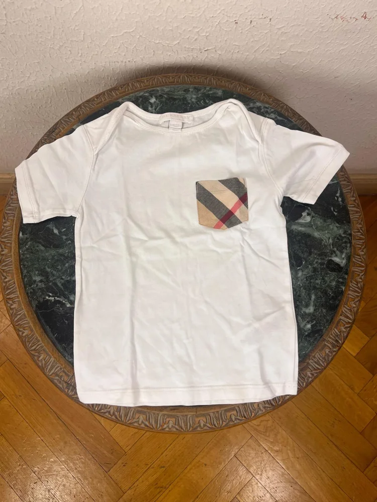 Burberry توبات