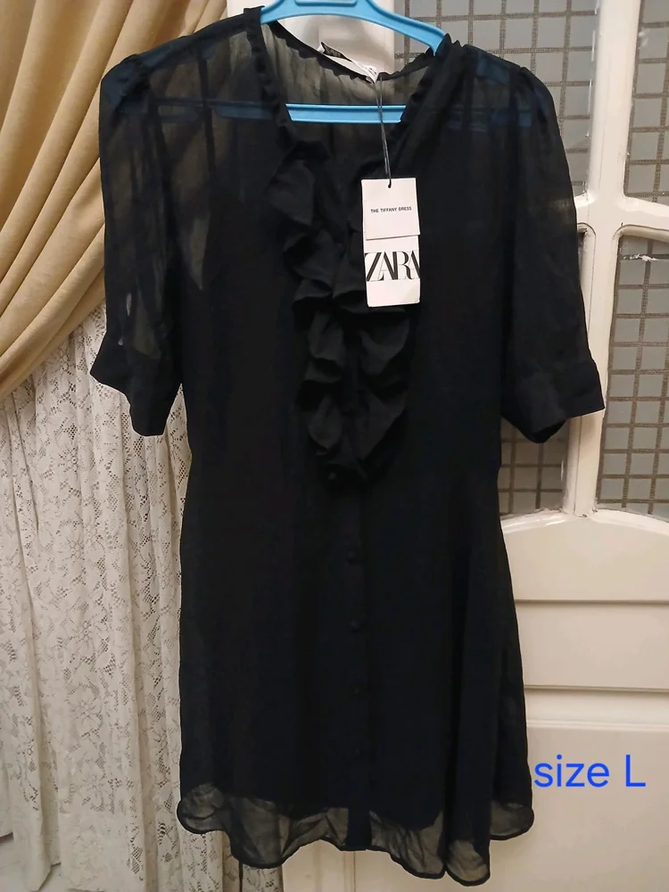Zara فساتين سواريه