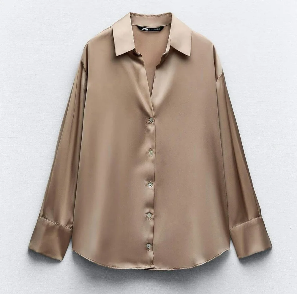 Zara قمصان