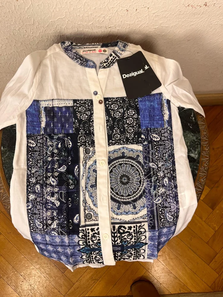 Desigual توبات