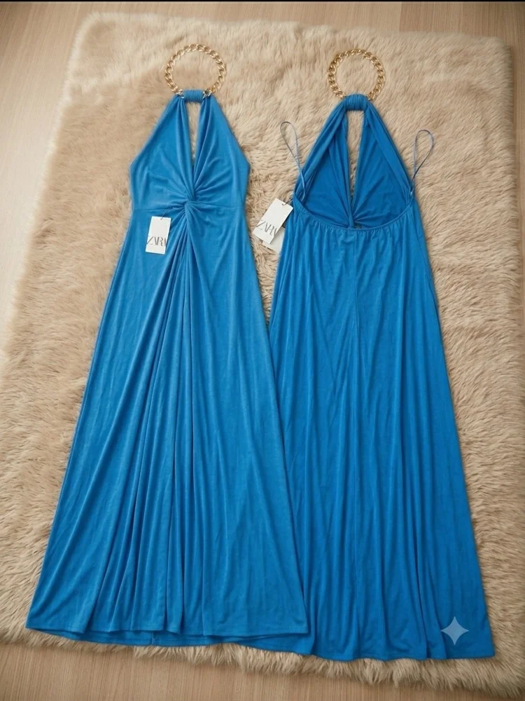 Zara فساتين سواريه