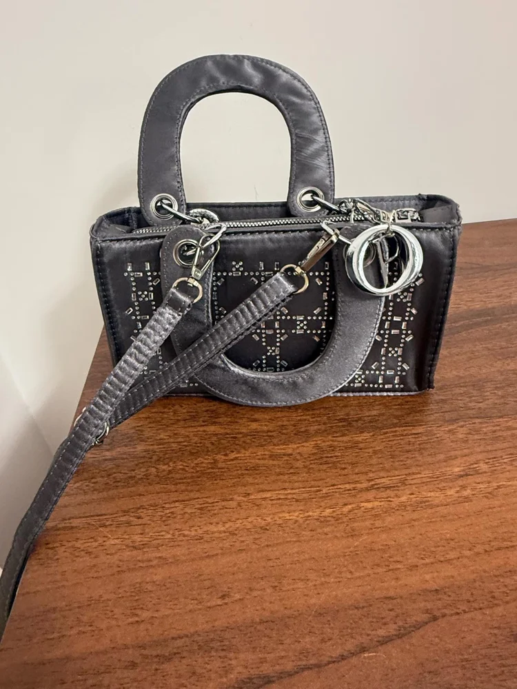 deja vu Shoulder Bag