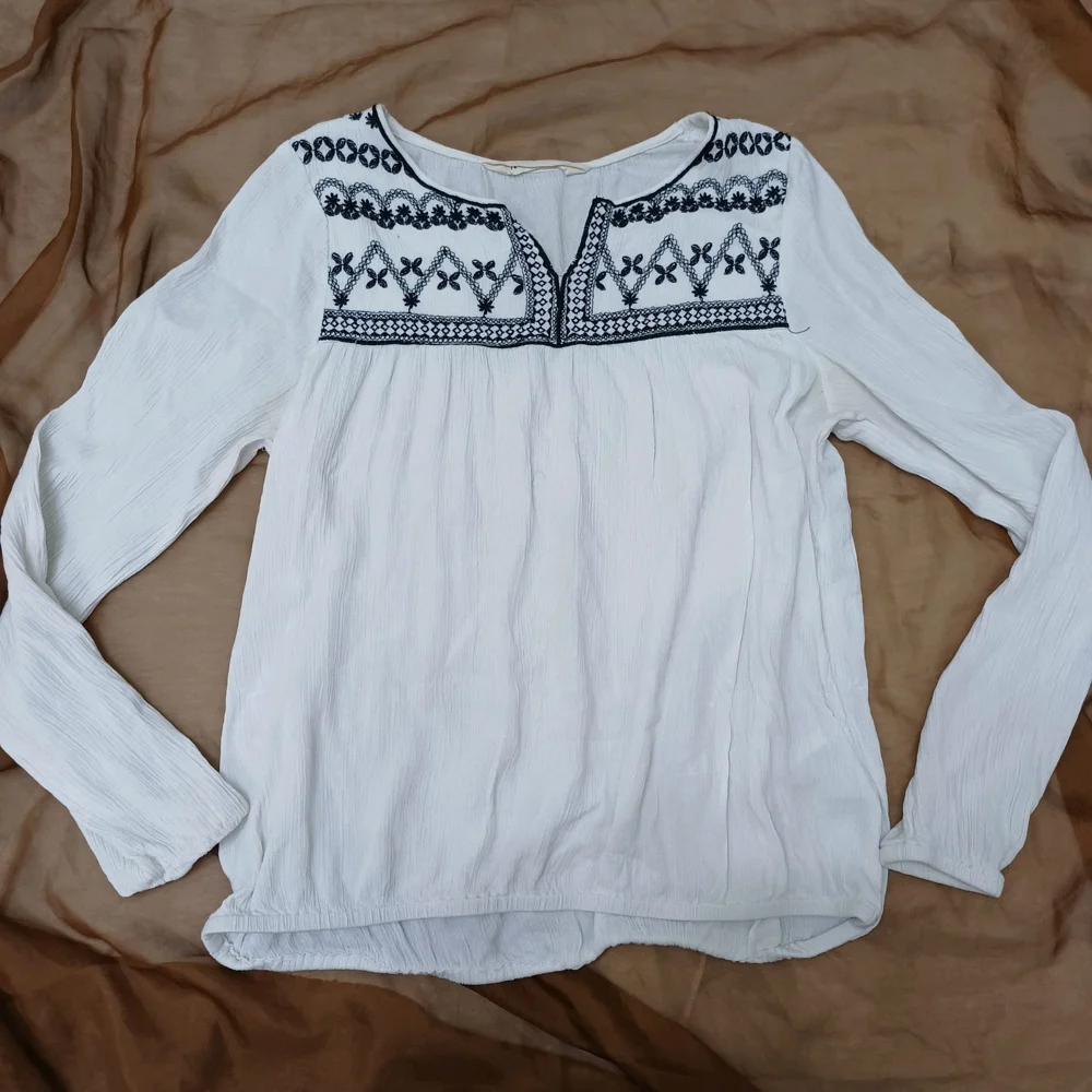 H&M بلوزات