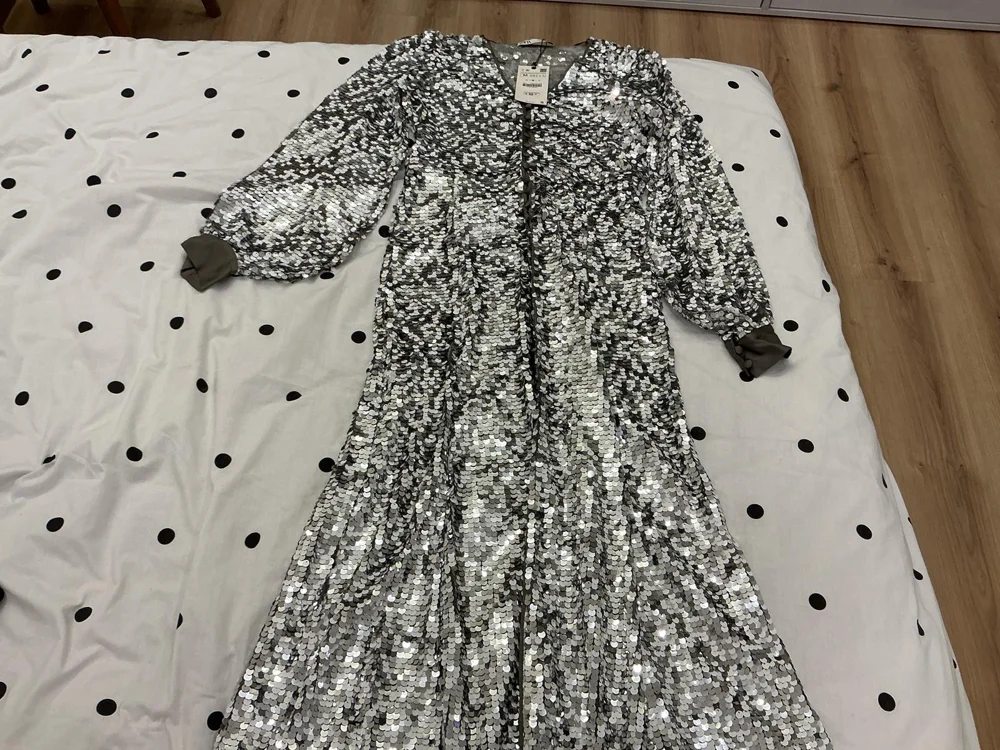 Zara فساتين سواريه