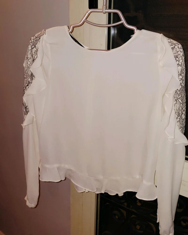 Zara بلوزات