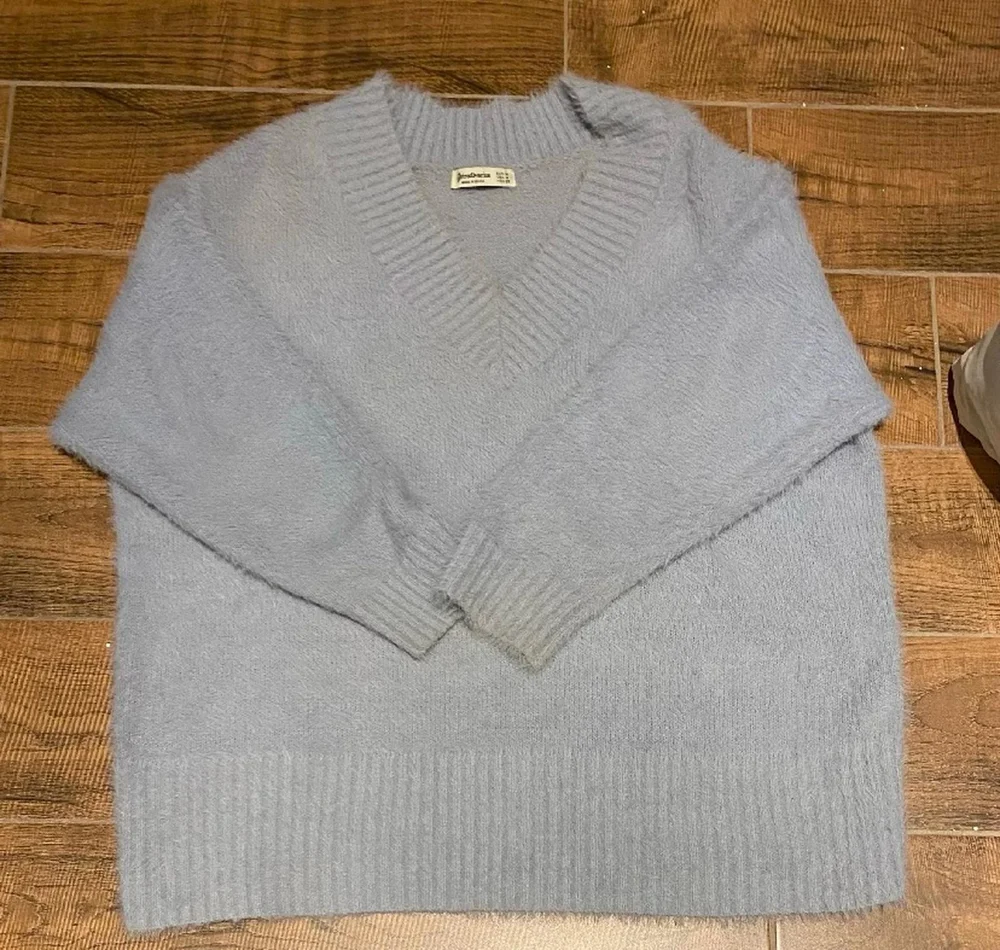Stradivarius سويترات وبلوفرات