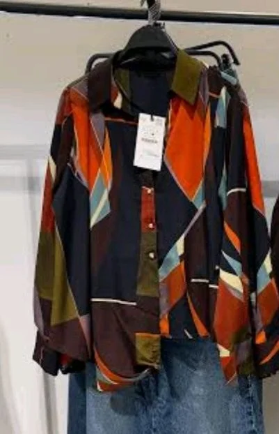 Zara قمصان