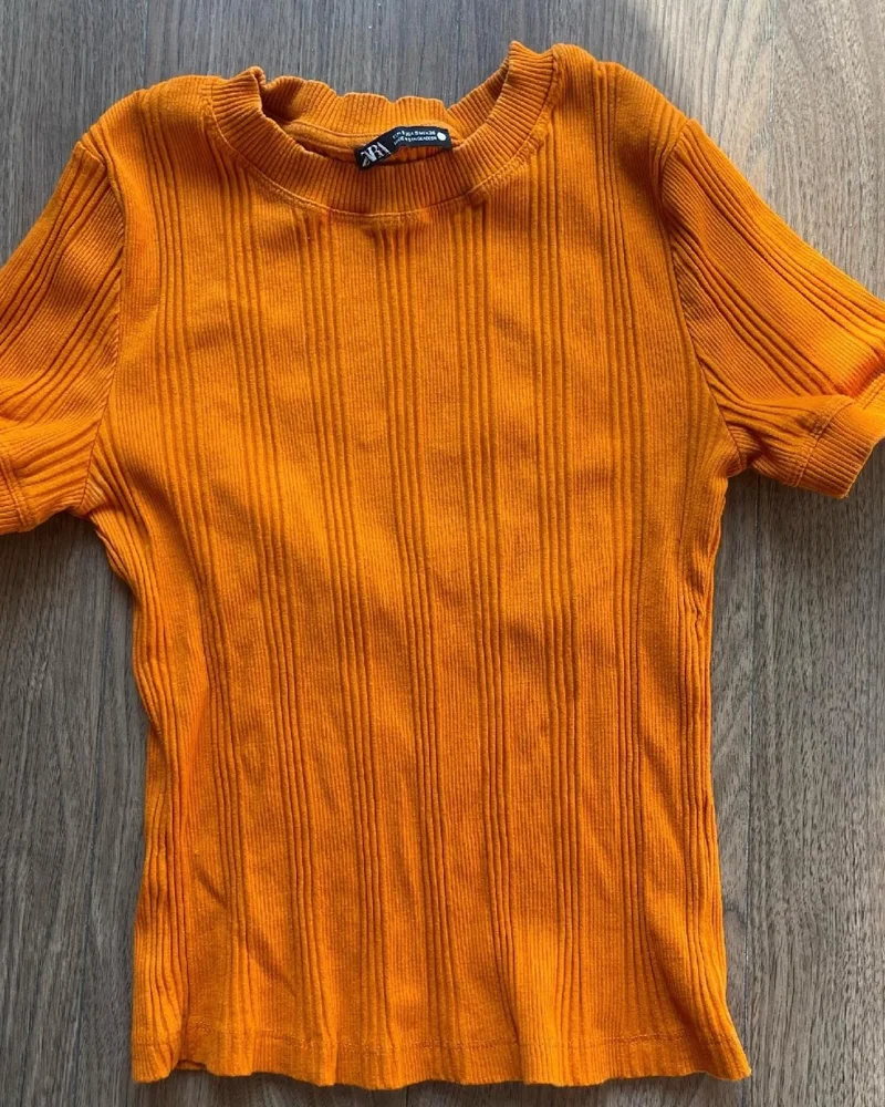 Zara تيشيرتات
