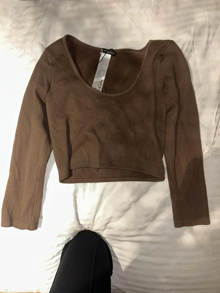 Zara بلوزات