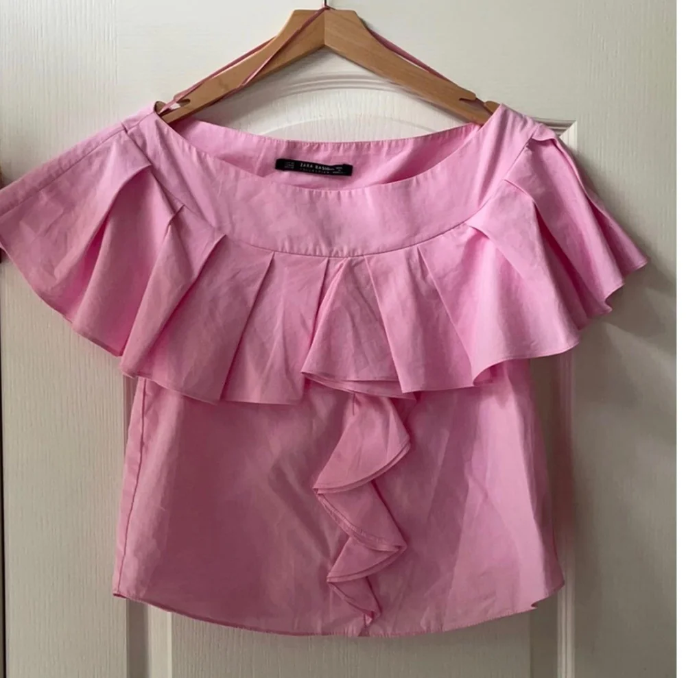 Zara بلوزات