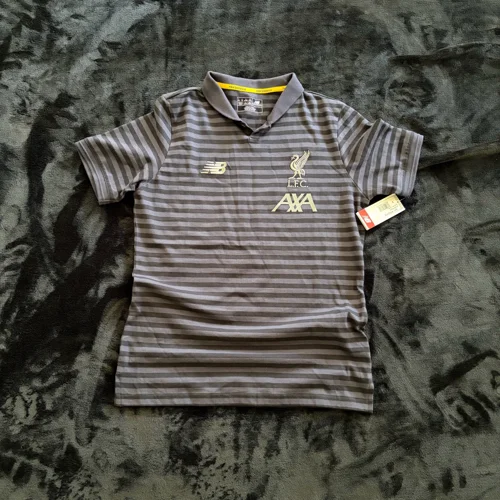 New Balance Polo Shirts